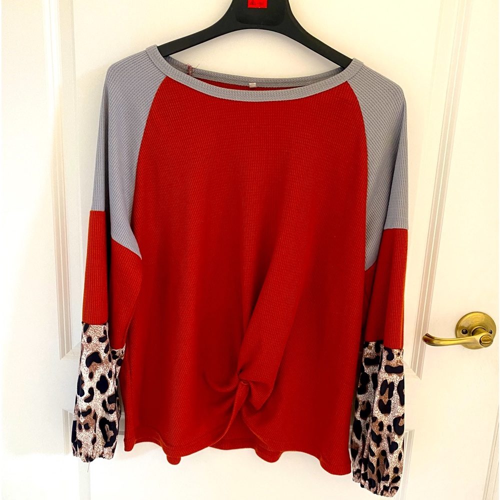 Women’s size L shirt.